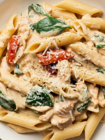 Rich and creamy Marry Me Chicken Pasta recipe with tender chicken, sun-dried tomatoes, spinach, and Parmesan in a flavorful garlic cream sauce. A delicious, easy 30-minute pasta dish perfect for dinner.